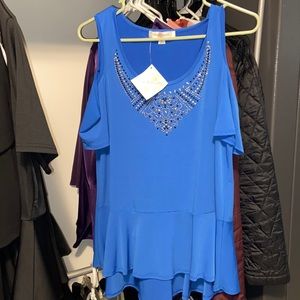 Beautiful shoulder off peplum blouse